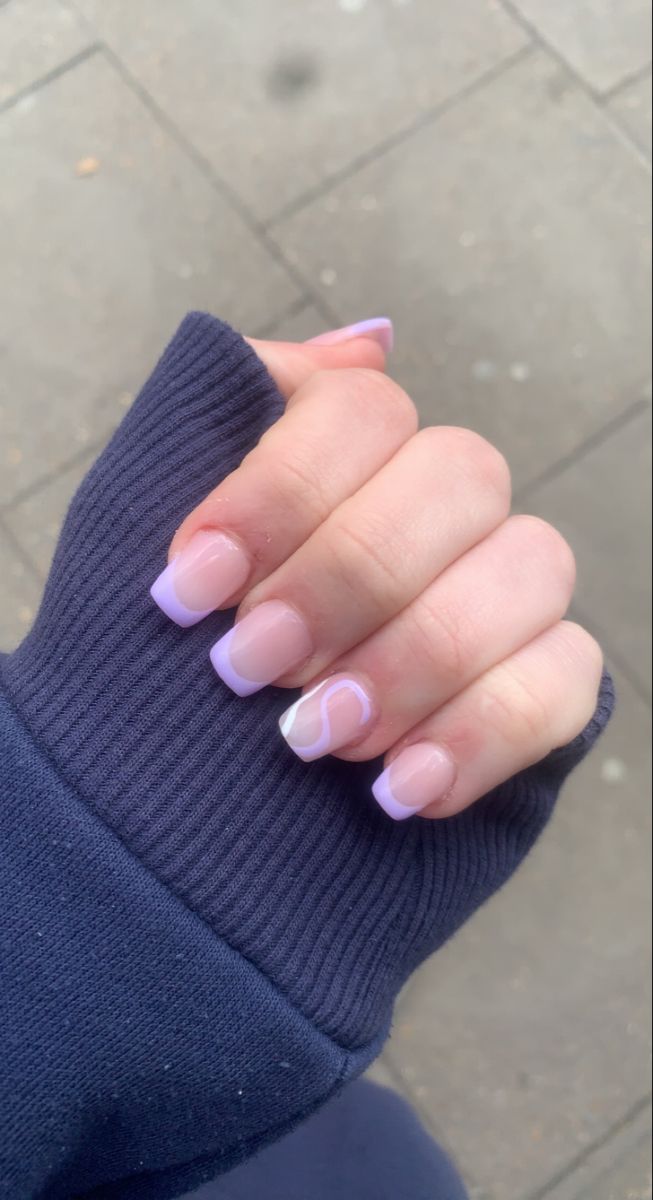 Elegant Soft Pink and Lavender French Manicure with Minimalist Swirl Detail.