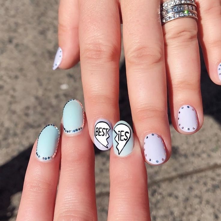 Pastel Nail Art: Unique Broken Heart Accents Celebrating Friendship