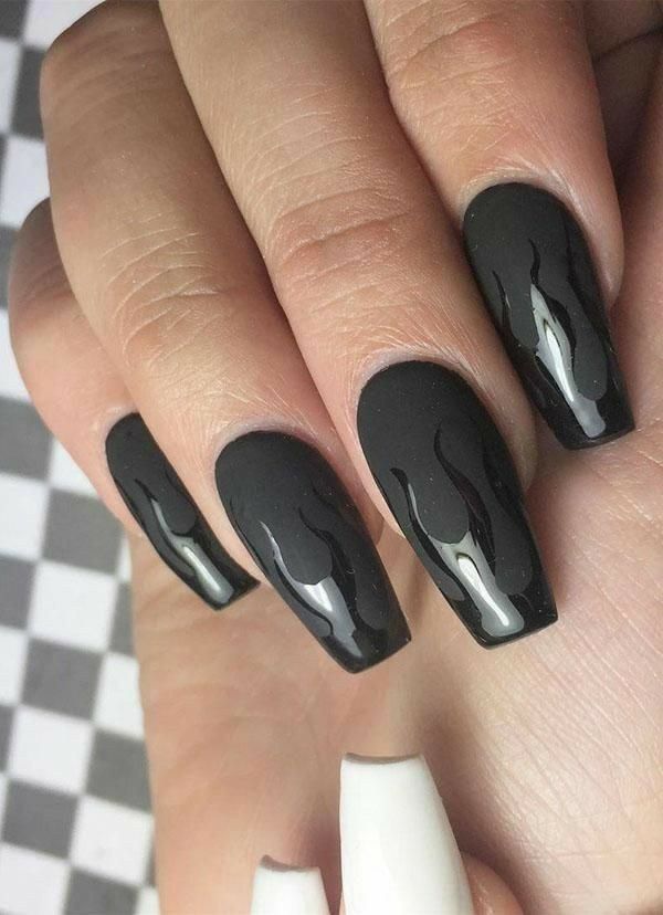 Bold Flame-Inspired Nail Art with Glossy Dripping Accents on a Sleek Black Base.