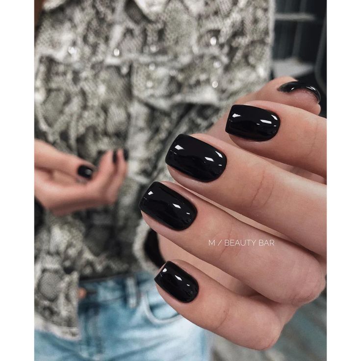 Elegant Glossy Black Nail Design: A Versatile Choice for Any Occasion.