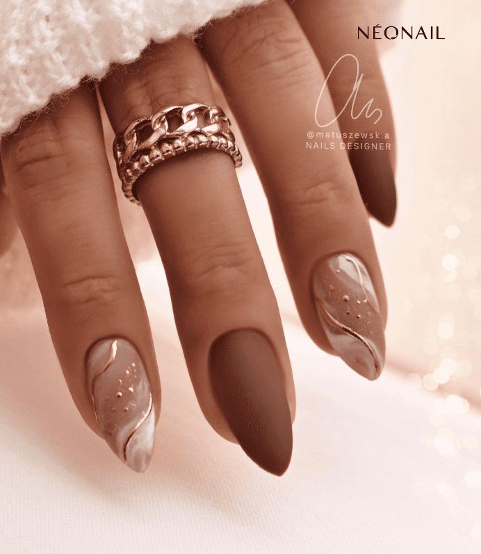 Sophisticated Matte Deep Brown Nail Design with Shimmering Accents and Gold Details.