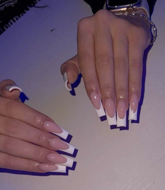 Modern Twist on Classic French Manicure: Elegant Nail Design with Nude Pink Base and Crisp White Tips.