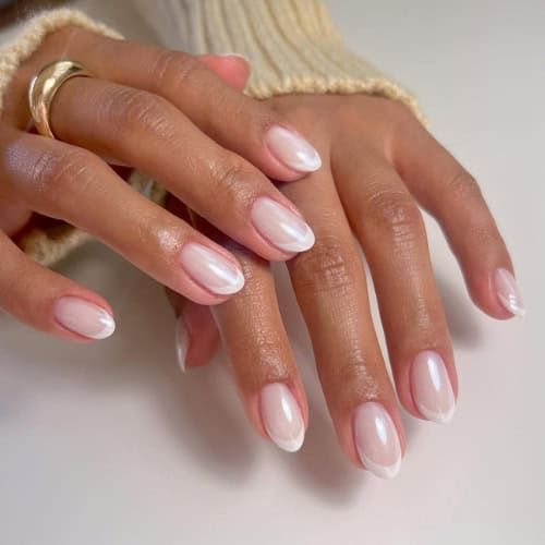 Chic Translucent Almond Nails with Subtle Gradient and White French Tips.