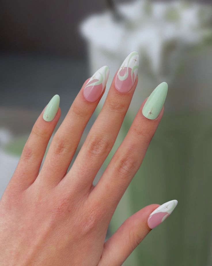 Elegant Almond-Shaped Nails with Mint Green and Blush Pink Design.