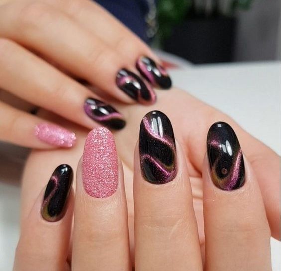 Chic Nail Design: Glossy Black and Glittery Pink Harmoniously Combined.