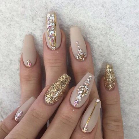 Elegant Matte and Glitter Nail Design with Rhinestones and Gold Accents