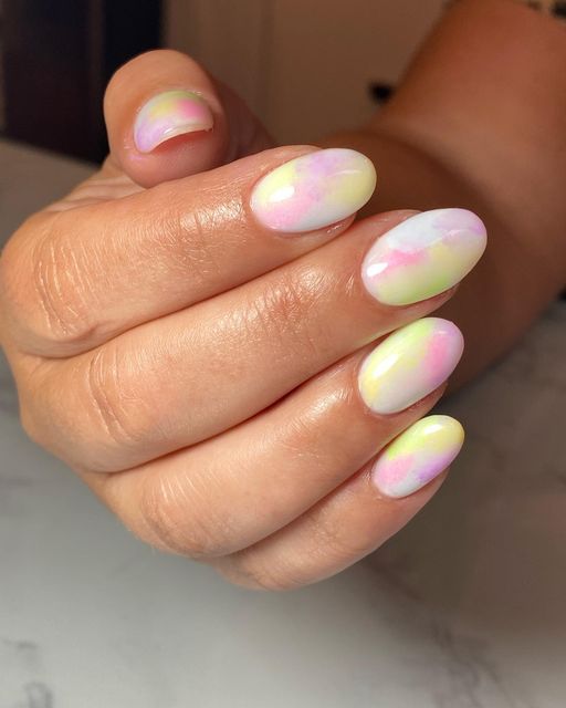 Pastel Gradient Nail Art: Elegant Springtime Design with Playful Watercolor Effect