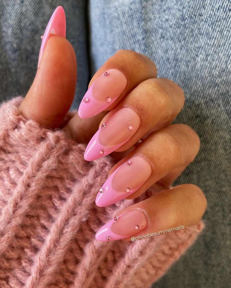 Chic Pink Ombre Nails with Gemstone Embellishments for Modern Elegance.