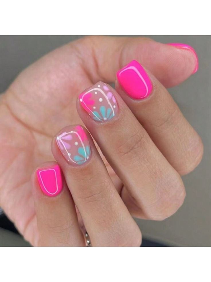 Playful Vibrant Nail Art: Bold Pink, Clear Designs, and Floral Accents for Spring/Summer.