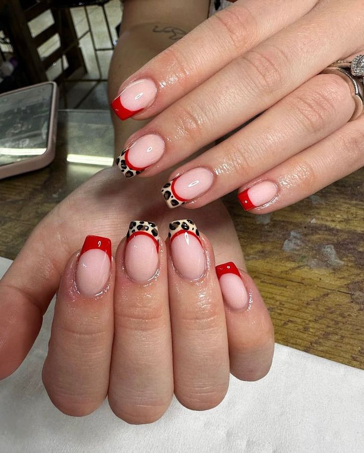 Chic Nail Design Blending Classic Red and Trendy Animal Print Accents