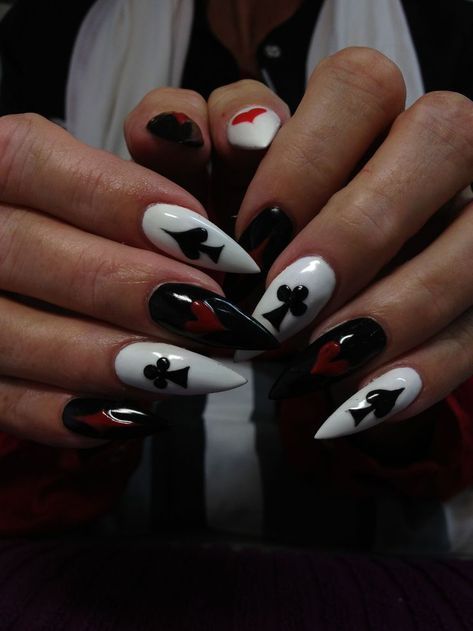 Bold Black, White, and Red Nail Art with Intricate Playing Card Patterns for a Dramatic Night Out.