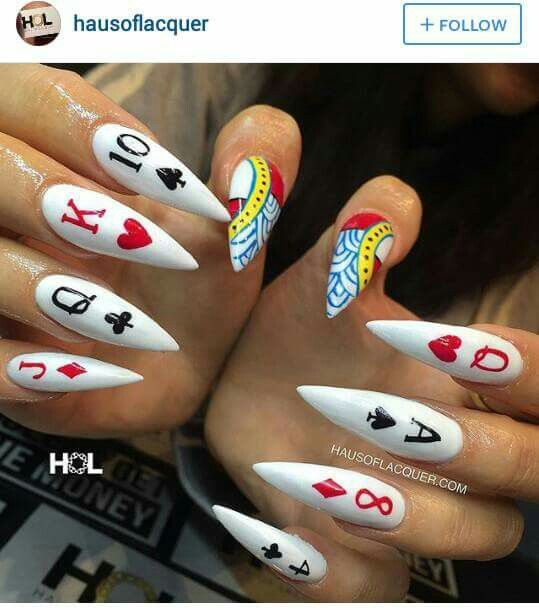 Playful Poker-Themed Nail Art with Bold Colors and Intricate Card Designs.