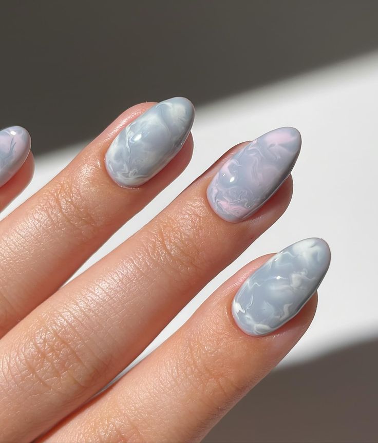 Elegant Pastel Marble Nail Design in Chic Oval Shape