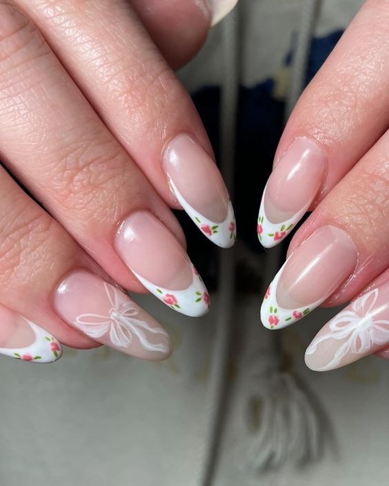 Elegant Floral-Inspired Nail Design with White Tips and Lace Accents.