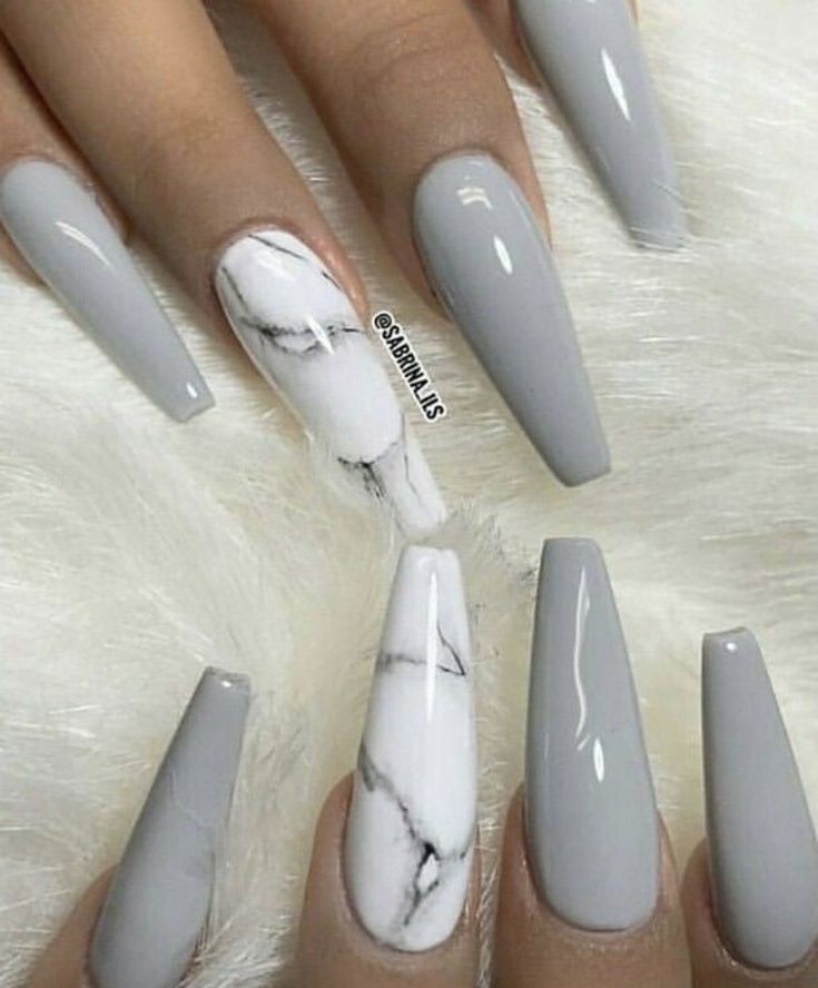 Elegant Nail Design: Chic Gray with Striking Marble Accent