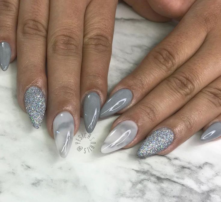 Elegant Gray Nail Design with Mixed Finishes and Unique Shapes.