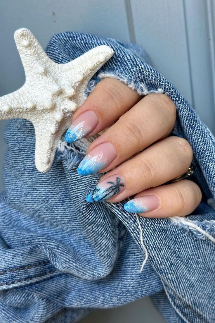 Tropical Ocean-Inspired Gradient Nail Design with Frosted Tips and Palm Tree Accent.