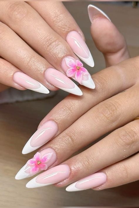 Sophisticated Almond-Shaped Nails with Nude Base, White Tips, and Floral Accents.