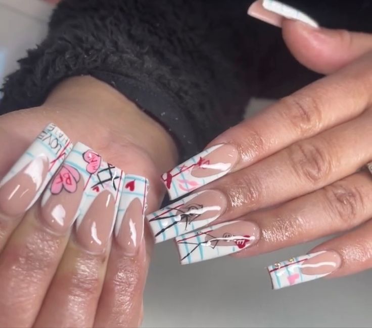 Elegant Whimsy: Stylish Long Nails with Nude and Graphic Designs