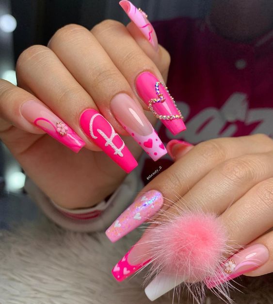 Fun and Flirty Vibrant Pink Nail Design with Intricate Embellishments