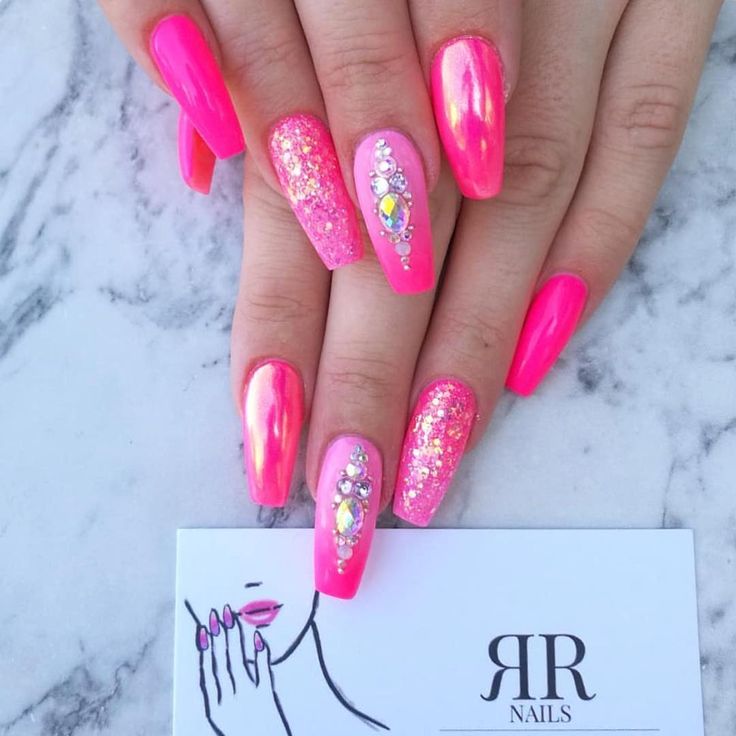 Glamorous Vibrant Pink Nail Design with Glossy, Glitter, and Holographic Finishes.