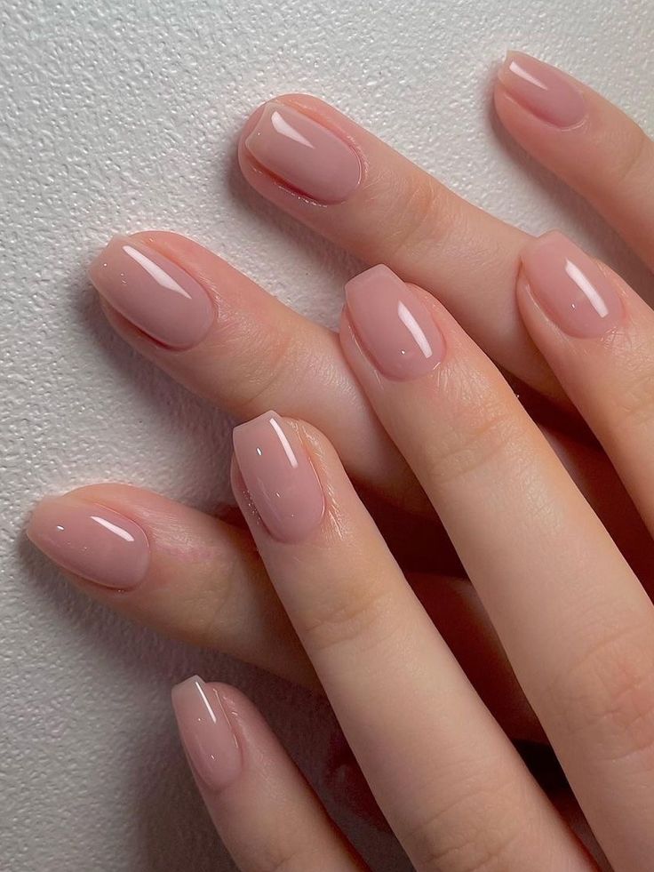 Sophisticated Elegant Nude Nail Design with Soft Pink Blends and Glossy Finish