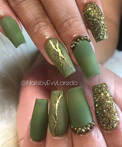 Luxurious Matte and Glitter Green Nail Design with Gold Accents.