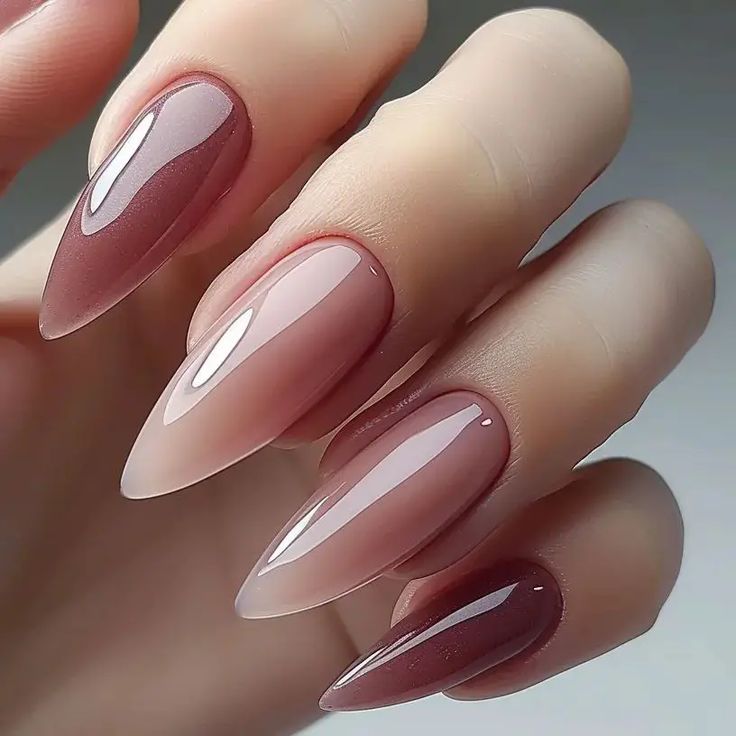 Sophisticated Ombre Almond-Shaped Nails: Rich Burgundy to Soft Nude Gradient with Glossy Finish.