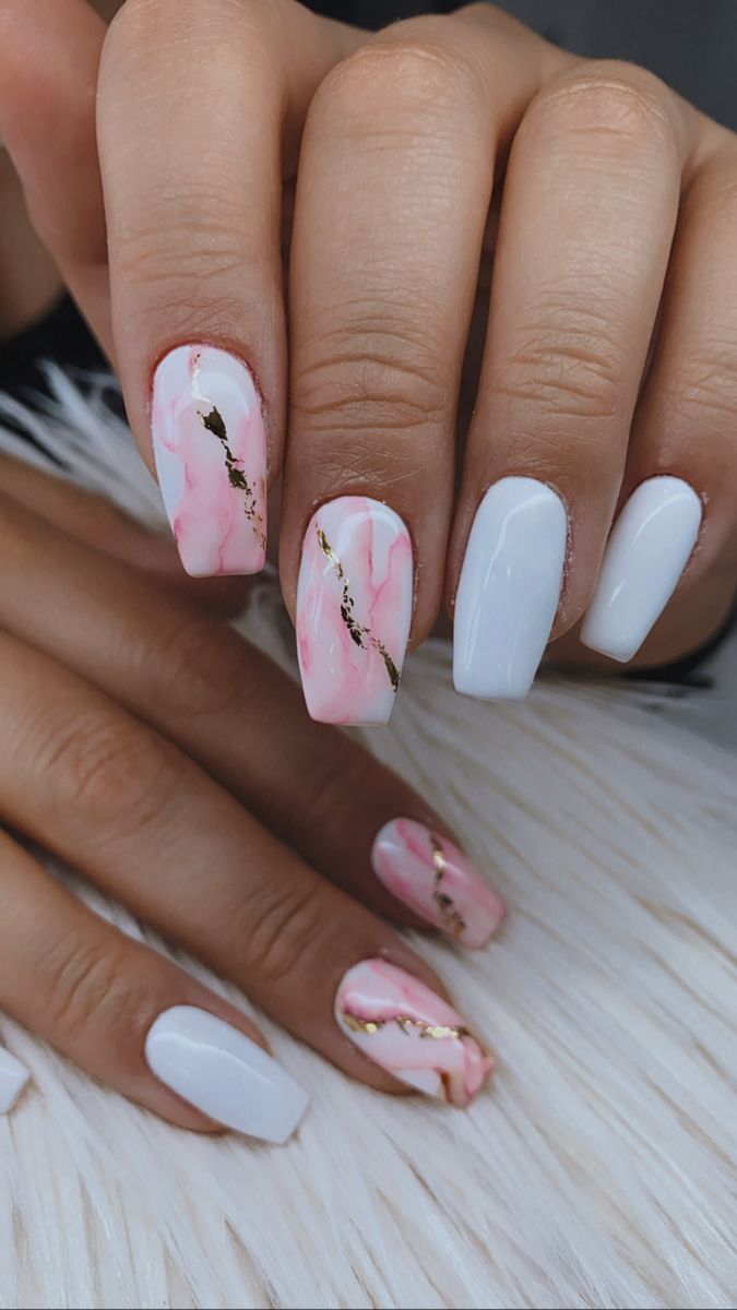 Chic Soft Pink Marble Nail Design with White Accents and Gold Stripes