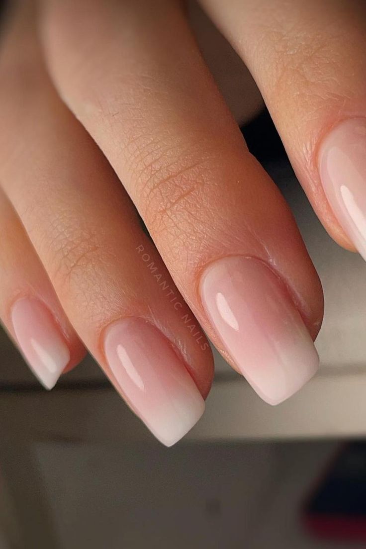 Chic Ombre Nails: A Timeless Blend of Light Pink and Crisp White for Any Occasion.