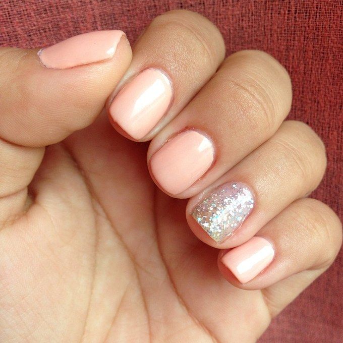 Charming Peach Nail Design with Glitter Accent for Understated Elegance