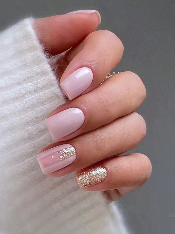 Chic and Modern Soft Pink and Glittery Gold Nail Design for Special Occasions.