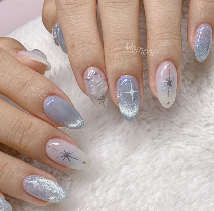 Celestial-Inspired Elegant Nail Design with Pastel Gradient and Shimmering Accents.