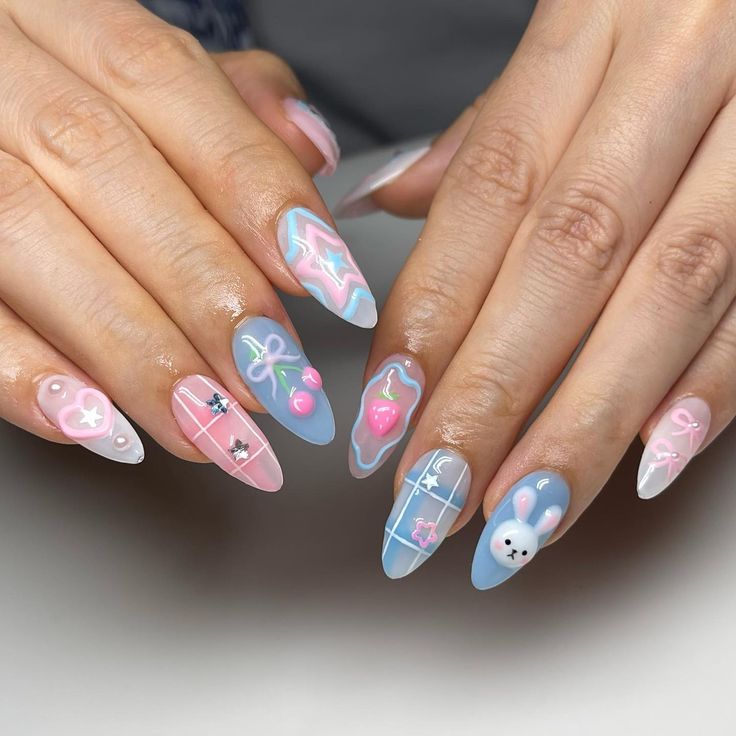 Playful Pastel Nail Design with Whimsical Patterns and Cute Motifs.