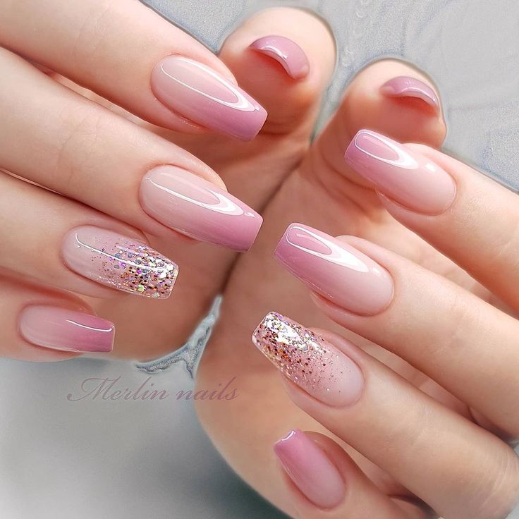 Chic Ombre Nail Design with Soft Pink Hues and Glitter Accents