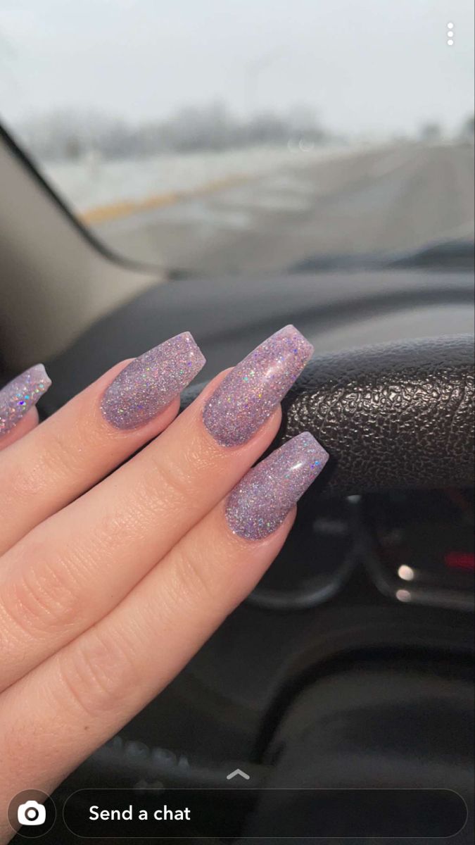 Dazzling Lavender Coffin Nails: A Modern Manicure of Elegance and Fun.