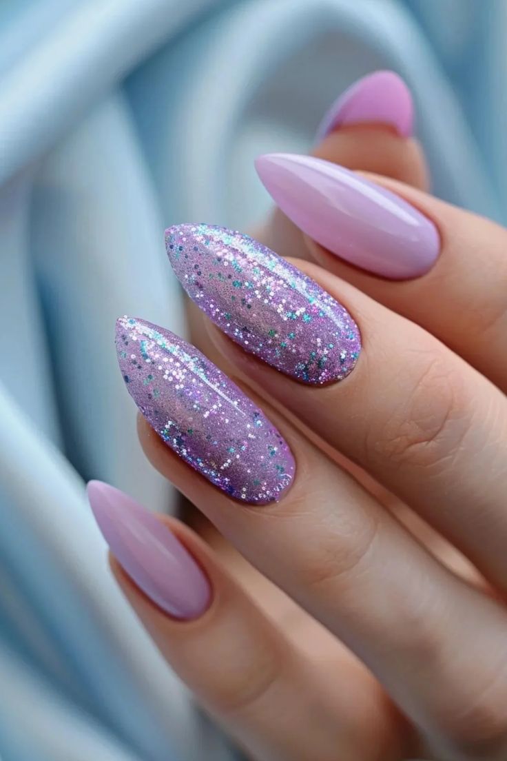 Chic Aesthetic Nail Design: Glossy Pastel Pink and Sparkling Lilac with Glittery Accents