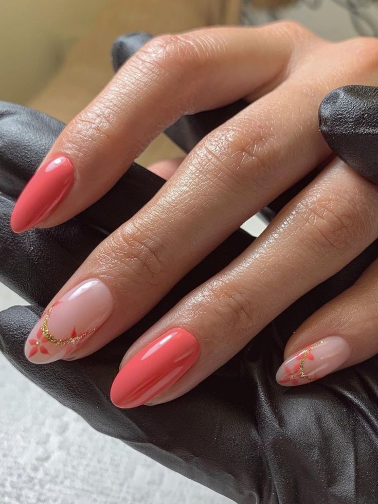 Elegant Manicure: Coral and Soft Pink with Glossy Finishes and Floral Accents