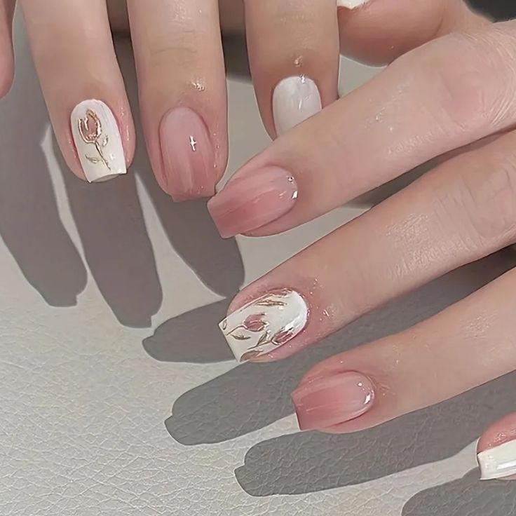 Elegant Floral Pastel Nails with Sophisticated Gold Accents