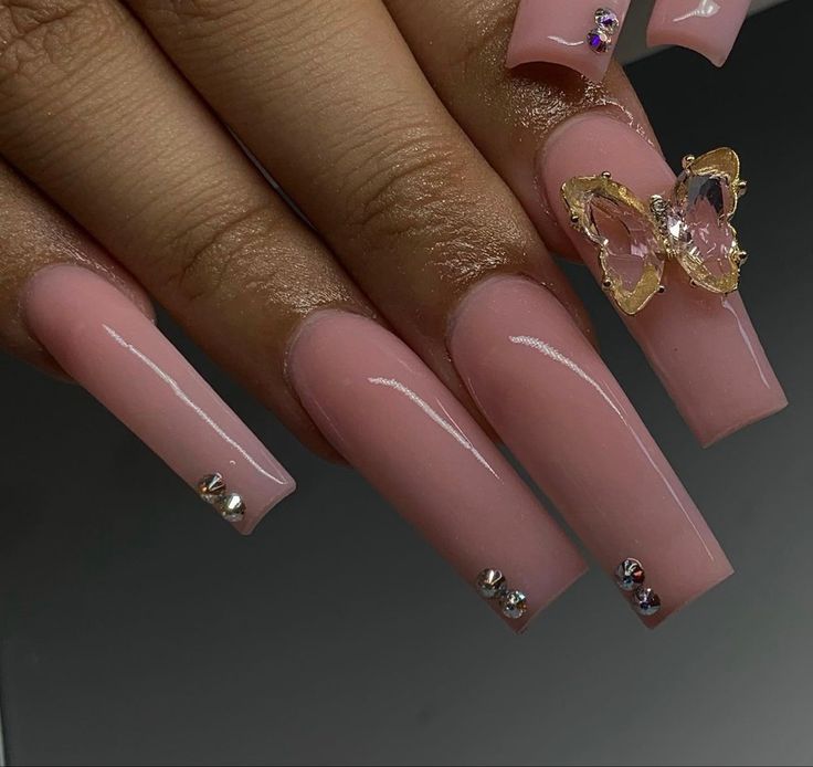 Chic Elegant Long Nails: Soft Pink Polish with Rhinestone and Butterfly Accents