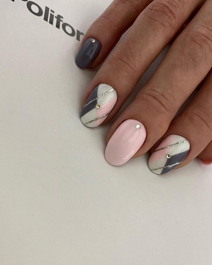 Sophisticated Playfulness: Elegant Nail Design with Pink, Gray, and Rhinestones