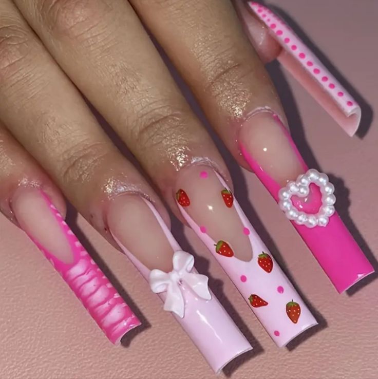 Whimsical Pink Nail Design with Glossy and Matte Finishes, Strawberry Accents, and Pearl-Adorned Heart.