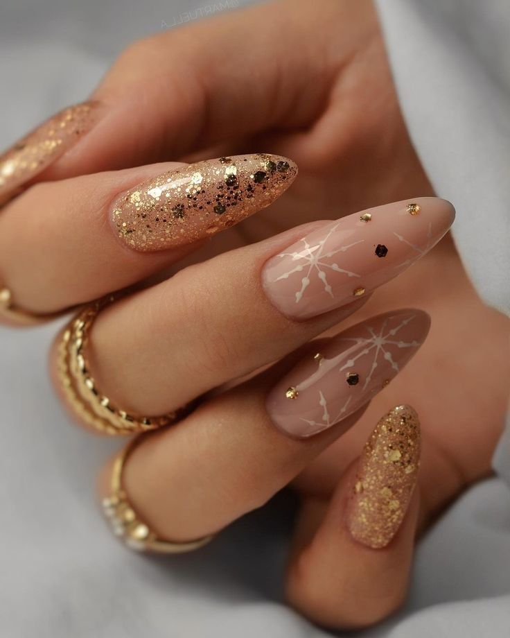 Sophisticated Elongated Stiletto Nails with Glitter, Textures, and Gold Accents