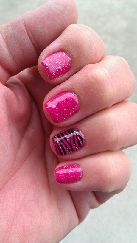 Playful Pink Zebra-Striped Nail Design with Glitter Accents