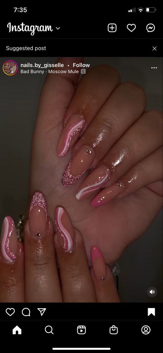 Elegant Soft Pink and White Swirl Nail Design with Glitter Accents