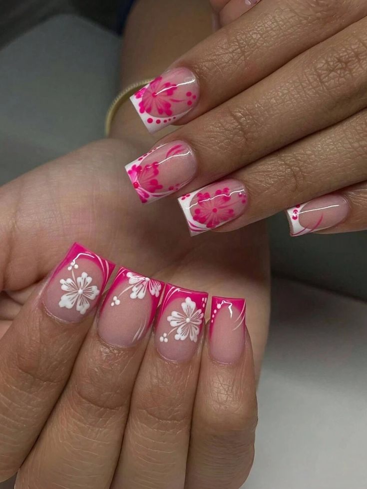 Vibrant Floral Nail Design with Ombre Tips and Sophisticated Detailing for Spring/Summer.