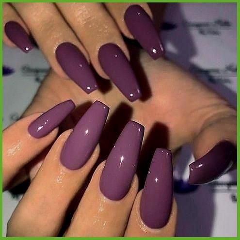 Chic Almond-Shaped Purple Nails: A Glossy, Sophisticated Design for Any Occasion.