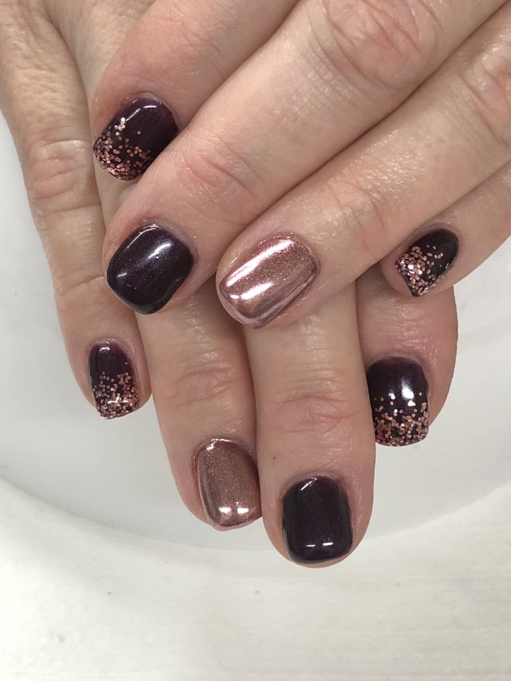 Chic Elegant Nail Design: Dark Purple and Rosy Metallic with Glam Sparkly Accents.