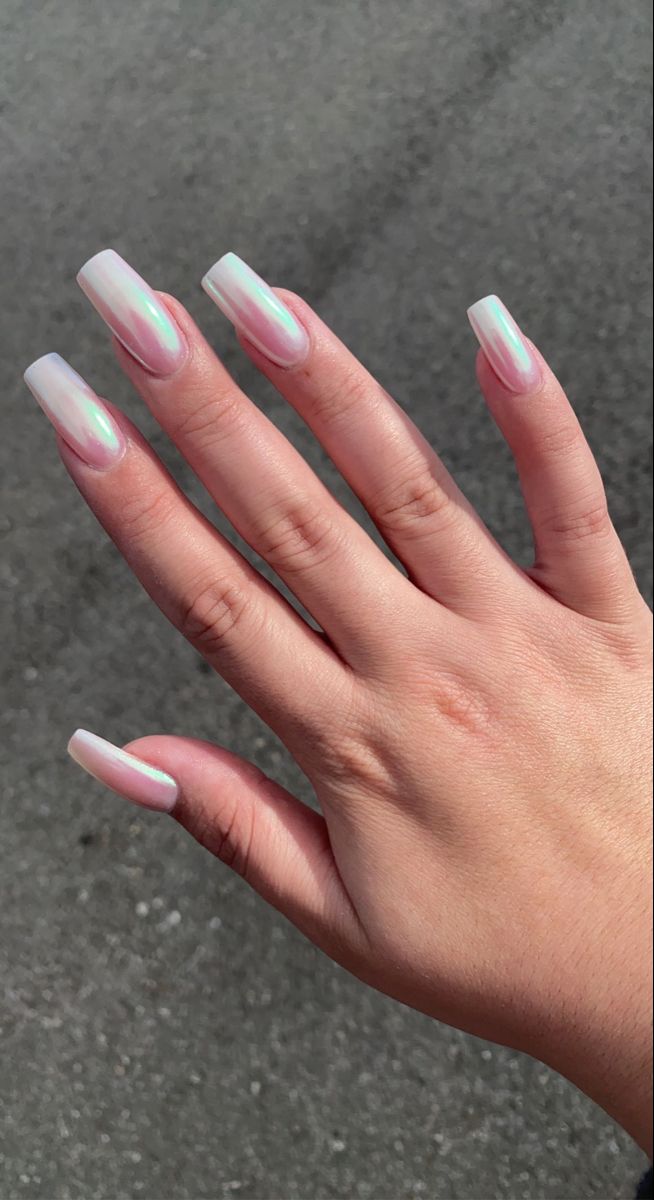 Elegant Iridescent Nail Design: Long Rectangular Nails with Subtle Holographic Sheen and Pastel Color Transitions.