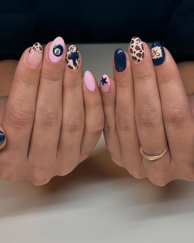 Trendy Eclectic Nail Design with Playful Patterns and Bold Color Contrast